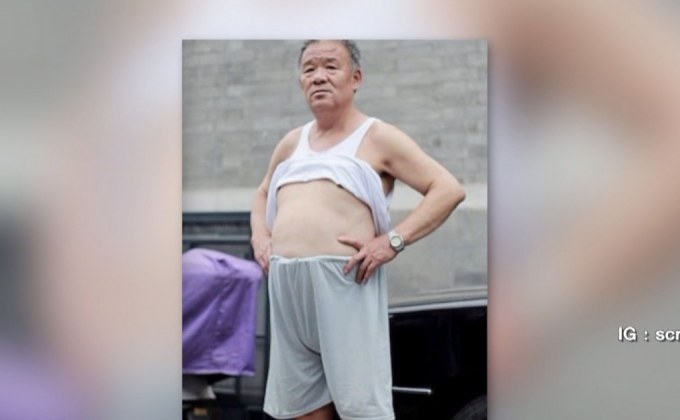 จีนสั่งห้ามผู้ชายม้วนเสื้อโชว์พุงคลายร้อน