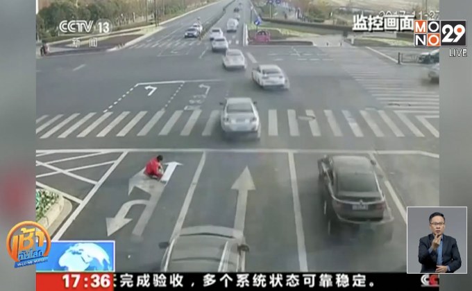 หนุ่มจีนวาดสัญลักษณ์บนถนนแก้ปัญหาจราจร