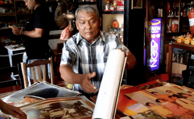 ประทับใจ ลุงมุสลิมตรัง สะสมภาพในหลวงกว่าพันชิ้น