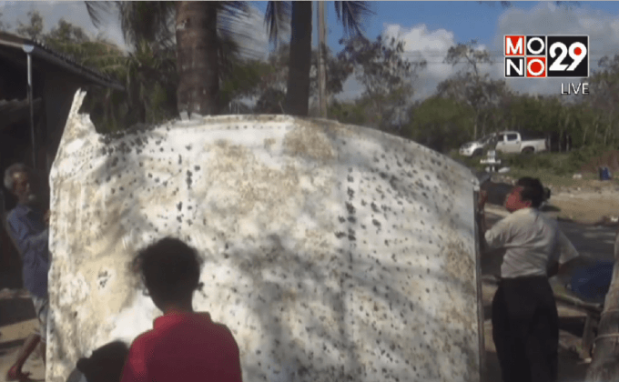 จนท.เตรียมเข้าตรวจสอบชิ้นส่วนเครื่องบิน